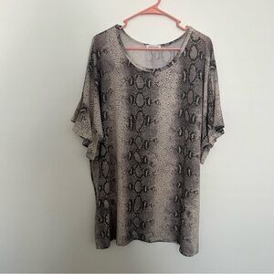 Snake print shirt with ruffle sleeves